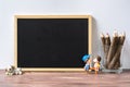 Mockup blank black chalkboard for your text or artwork. Frame with a copy space. Lover background concept Royalty Free Stock Photo