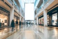 Mockup of a blank, empty billboard, facing the camera, large and busy shopping mall hall, blurred moving people Royalty Free Stock Photo