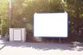 Mockup of a blank empty white advertising urban billboard, placeholder template city street, space for design layout.