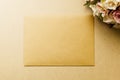 Mockup blank envelop on kraft paper for Valentine`s Day. Mock up for elegant design. Flat lay top view valentine`s day backgroun