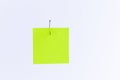 Mockup of a Blank Green Memo Paper with Copy Space Hanging on a Fishing Hook