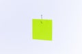 Mockup of a Blank Green Memo Paper with Copy Space Hanging on a Fishing Hook