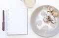 Mockup with blank notepad, cup of coffee and biscuit. New year cookies and cappuccino. Christmas morning still life. Royalty Free Stock Photo