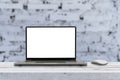 Mockup blank screen laptop on desk. Workspace with laptop Royalty Free Stock Photo
