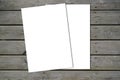 Mockup blank two white paper and space for text on old wooden plank background Royalty Free Stock Photo