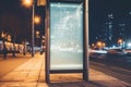 Mockup. Blank white vertical advertising banner billboard stand in urban bus stop at night. Empty advertisement place Royalty Free Stock Photo