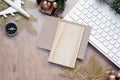 Mockup blank wood board for Christmas New Year holiday travel background concept on home office desk, Flat lay top view mock up Royalty Free Stock Photo