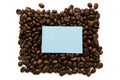 Mockup of a blue note on a solid background of many coffee beans Royalty Free Stock Photo