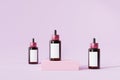 Mockup bottles with label for cosmetics products, template or advertising, pink background, 3d illustration render