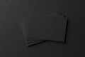 Mockup of business cards fan stack at black textured paper background. Royalty Free Stock Photo