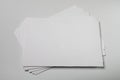 Mockup of business cards fan stack at empty white textured paper background Royalty Free Stock Photo