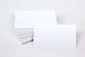 Mockup of business cards fan stack at white textured paper background. Royalty Free Stock Photo