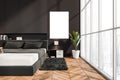 Mockup canvas near floor to ceiling window in modern grey bedroom Royalty Free Stock Photo