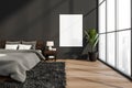 Mockup canvas near window in modern grey bedroom Royalty Free Stock Photo