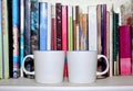 Mockup ceramic mug on old book background clipping path Royalty Free Stock Photo