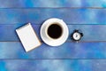 Mockup for check list, empty note paper with coffee cup on blue wood background.