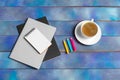 Mockup for check list, empty note paper with coffee cup on blue wood background. Office, writer or study concept