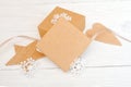 Mockup Christmas gift boxes with wooden star and heart, with space for your text