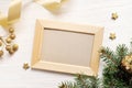 Mockup Christmas greeting card top view and wood frame, flatlay on a white wooden background with a ribbon, with place Royalty Free Stock Photo