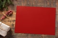 Mockup Christmas red greeting card with tree candy cane, flatlay on a rustic wooden background, with place for your text Royalty Free Stock Photo