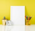 Mockup with clean white frame, colored pencils on the bright yellow background. Concept for creativity, drawing. Royalty Free Stock Photo