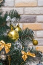 Mockup with decorated Christmas tree. Composition with gold and silver baubles, bows, animals, bells, lit garlands. Copy-space on Royalty Free Stock Photo