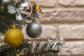 Mockup with decorated Christmas tree. Composition with gold and silver baubles, bows, animals, bells, lit garlands. Copy-space on Royalty Free Stock Photo