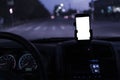 mockup design of the smartphone attached to the windscreen inside the car Royalty Free Stock Photo