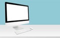 Mockup desktop computer display blank screen on desk in office, workspace with mock up computer screen empty and keyboard Royalty Free Stock Photo