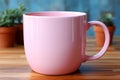 A mockup with an empty pink mug