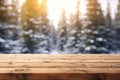 Mockup of empty wooden display product stand, table with blurred snow pine trees forest in morning sunlight, peaceful winter Royalty Free Stock Photo