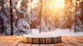 Mockup of empty wooden display, round wood product stand with blurred snow pine trees forest in morning sunlight, peaceful winter Royalty Free Stock Photo