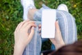 Mockup of female hand holding cell phone with blank screen Royalty Free Stock Photo