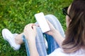 Mockup of female hand holding cell phone with blank screen Royalty Free Stock Photo