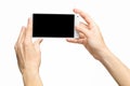 Mockup of female hand holding frameless cell phone with blank screen Royalty Free Stock Photo