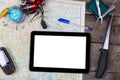 Mockup with fishing tackles and navigator on map Royalty Free Stock Photo