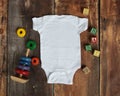 Mockup Flat Lay of white baby bodysuit shirt Royalty Free Stock Photo
