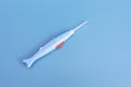 Mockup Flatly Ear Wax Removal Stick with Light Or Curette on Blue Background, Copy Space Royalty Free Stock Photo