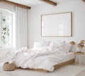 Mockup frame in bedroom interior background, Coastal boho style Royalty Free Stock Photo