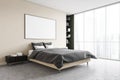 Mockup frame in beige bedroom, grey bed with linens near window