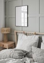 Mockup frame in cozy simple bedroom interior background Royalty Free Stock Photo