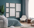 Mockup frame in dark green bedroom interior background Royalty Free Stock Photo