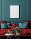 Mockup frame in dark green home interior with red sofa, table and decor