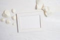 Mockup frame with flowers and bow greeting card for Valentines Day or wedding with place for your text. Flat lay, top Royalty Free Stock Photo