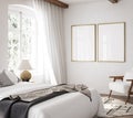 Mockup frame in luxury Hampton style bedroom interior Royalty Free Stock Photo