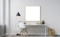 Mockup frame poster Home office concept. Empty vertical wooden picture hanging on white wall. Wooden desk, table. Elegant working Royalty Free Stock Photo