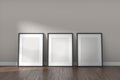 Mockup frames on empty white room with clear wall and wood floor. Modern minimal style