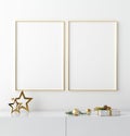 Mockup golden frame with Christmas decor on cupboard close up