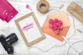 Mockup golden picture frame for travel with valentines day & love season background concept. Top view of mock up photo frame with Royalty Free Stock Photo