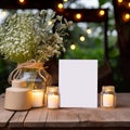 mockup harmoniously blends paper, candle, and flowers into a stylish and minimalistic presentation